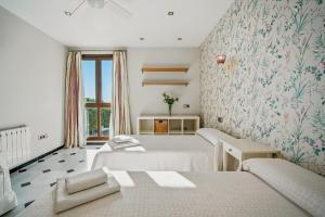Posteľ alebo postele v izbe v ubytovaní Casa Vejer en alto