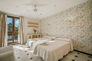 Posteľ alebo postele v izbe v ubytovaní Casa Vejer en alto