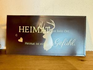 Vottorð, verðlaun, skilti eða annað skjal til sýnis á Ferienwohnung Allgäutraum - hochwertig, mit Whirlpoolwanne und Kaminofen