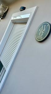 a sign on the side of a building at AVG Studios Preveza in Mytikas