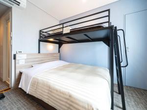Katil atau katil-katil dalam bilik di Super Hotel Shiga Nagahama Tennen Onsen