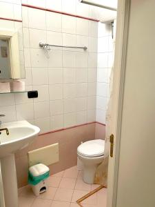 a bathroom with a toilet and a sink at Mary Apt - Historical Residence- Lecce in Lecce +17 photos