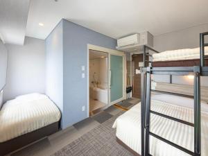 Katil atau katil-katil dalam bilik di Super Hotel Shiga Nagahama Tennen Onsen +31 gambar