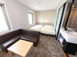 Katil atau katil-katil dalam bilik di Super Hotel Shiga Nagahama Tennen Onsen