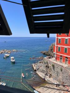 a view of a body of water with boats at Mistral in Riomaggiore