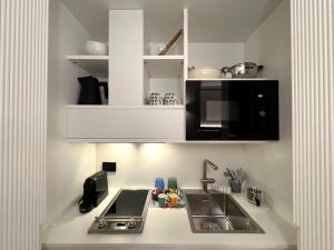 Η κουζίνα ή μικρή κουζίνα στο B&B Les Capitaineries