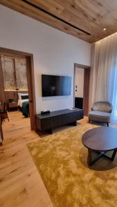 TV a/nebo společenská místnost v ubytování Pendeli Resort