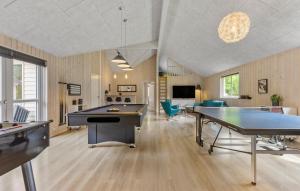 a large room with a pool table and ping pong ball at Holiday Home Frederiksværk - 01 in Melby