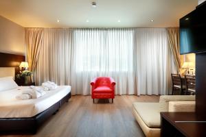 Postel nebo postele na pokoji v ubytování Tuscany Inn