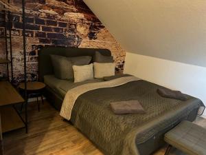 Postel nebo postele na pokoji v ubytování Ferienwohnung Zeitz - Weiße Elster Apartment