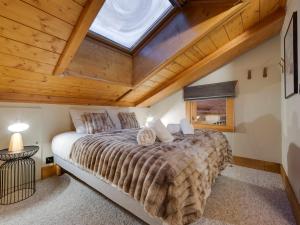Łóżko lub łóżka w pokoju w obiekcie Duplex confortable au cœur de Tignes Val Claret, 3 chambres, proche centre et navettes - FR-1-641-14