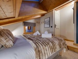 Łóżko lub łóżka w pokoju w obiekcie Duplex confortable au cœur de Tignes Val Claret, 3 chambres, proche centre et navettes - FR-1-641-14