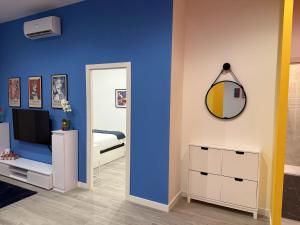 Un televizor și/sau centru de divertisment la Moderno apartamento en Madrid climatizado