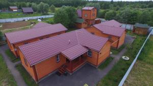 an overhead view of a row of houses with red roofs at Vladimirskiy Hutorok in Vladimir