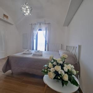 Postel nebo postele na pokoji v ubytování AL BELVEDERE