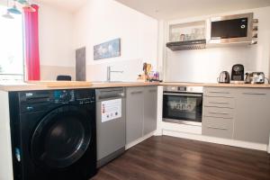 Kuchyňa alebo kuchynka v ubytovaní Hyper Centre Orléans : Magnifique appartement