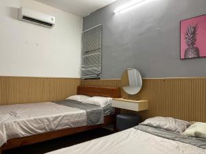 Ένα ή περισσότερα κρεβάτια σε δωμάτιο στο NY House căn hộ 2pn Gần Biển