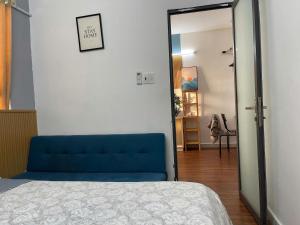 Ένα ή περισσότερα κρεβάτια σε δωμάτιο στο NY House căn hộ 2pn Gần Biển