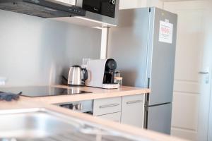 Kuchyňa alebo kuchynka v ubytovaní Hyper Centre Orléans : Magnifique appartement