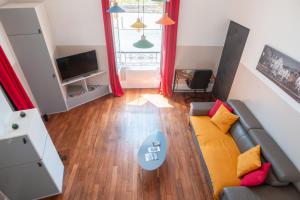Televízia a/alebo spoločenská miestnosť v ubytovaní Hyper Centre Orléans : Magnifique appartement