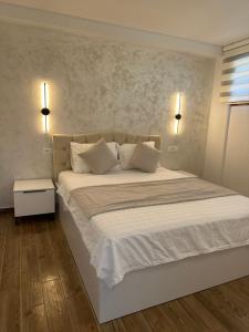 Postel nebo postele na pokoji v ubytování Treva Hotel & Apartaments