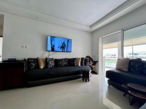 Ruang duduk di OlaBlanca2, appartement avec terrasse et vue sur piscine