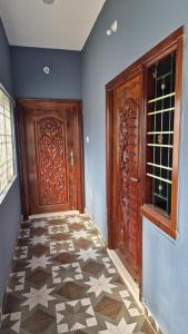 Ένα ή περισσότερα κρεβάτια σε δωμάτιο στο Smart Homestay & Residency +7 φωτογραφίες