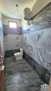 Ένα μπάνιο στο Smart Homestay & Residency