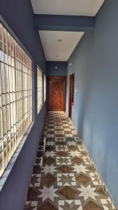 Ένα ή περισσότερα κρεβάτια σε δωμάτιο στο Smart Homestay & Residency