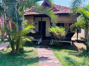 Zahrada ubytování Maadathil cottages & Beach Resort