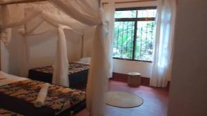 Ảnh trong thư viện ảnh của Karibu Burudika B&B ở Moshi +7 ảnh