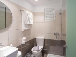 Kúpeľňa v ubytovaní AGRELLI Hotel & Suites