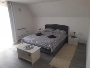 Una cama o camas en una habitación de Miličin konak