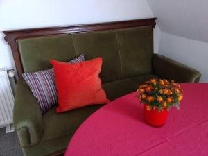 Posezení v ubytování Ferienwohnung unterm Reetdach