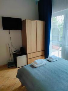 Postel nebo postele na pokoji v ubytování Pensjonat Gorzowiak