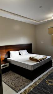 Postel nebo postele na pokoji v ubytování شقق المصيف2