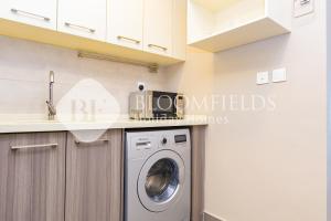 Una cocina o cocineta en Bloomfields Deluxe 1Br with Balcony Leonardo
