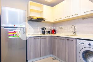 Una cocina o cocineta en Bloomfields Deluxe 1Br with Balcony Leonardo