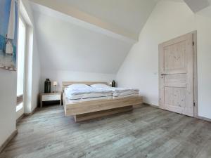 Postel nebo postele na pokoji v ubytování Ferienhaus Juliusruh