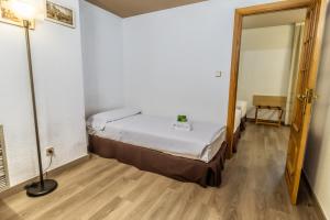 Postel nebo postele na pokoji v ubytování Pacoche Murcia