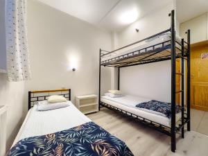 Posteľ alebo postele v izbe v ubytovaní Arcus Premium Hostel