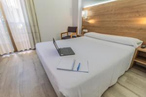 Postel nebo postele na pokoji v ubytování Pacoche Murcia