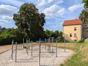 a group of monkey bars in a playground at Ferienwohnung Teichblick in Altenburg