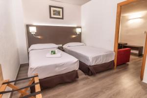 Postel nebo postele na pokoji v ubytování Pacoche Murcia