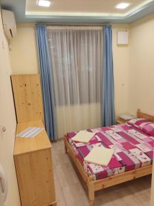 Ένα ή περισσότερα κρεβάτια σε δωμάτιο στο Luxury Studio Neptune Center