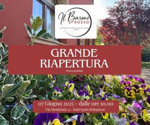 a sign for a garden in front of a building at Il Barone Rosso in SantʼAgata Bolognese