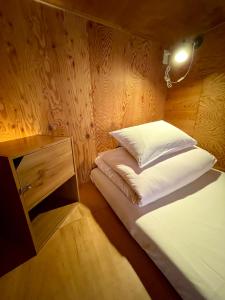 Voodi või voodid majutusasutuse Nomad Hostel Classic toas