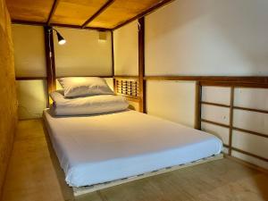 Voodi või voodid majutusasutuse Nomad Hostel Classic toas