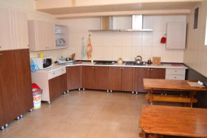 Kjøkken eller kjøkkenkrok på Vek Guest House