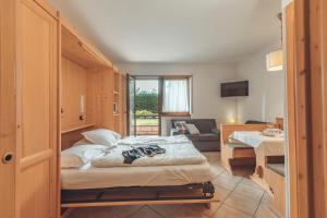 Posteľ alebo postele v izbe v ubytovaní Aparthotel Majestic